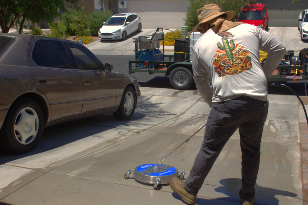 Pressure washing a driveway