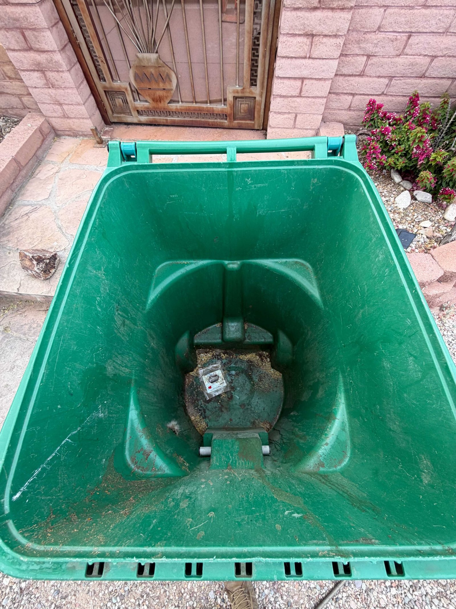 Dirty trash bin before Saguaro Sanitation cleaning